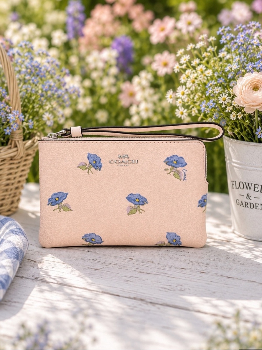 Coach Pink Floral Wristlet with Blue Flower Print
